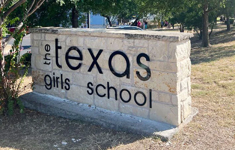 Outdoor sign for The Texas Girls School